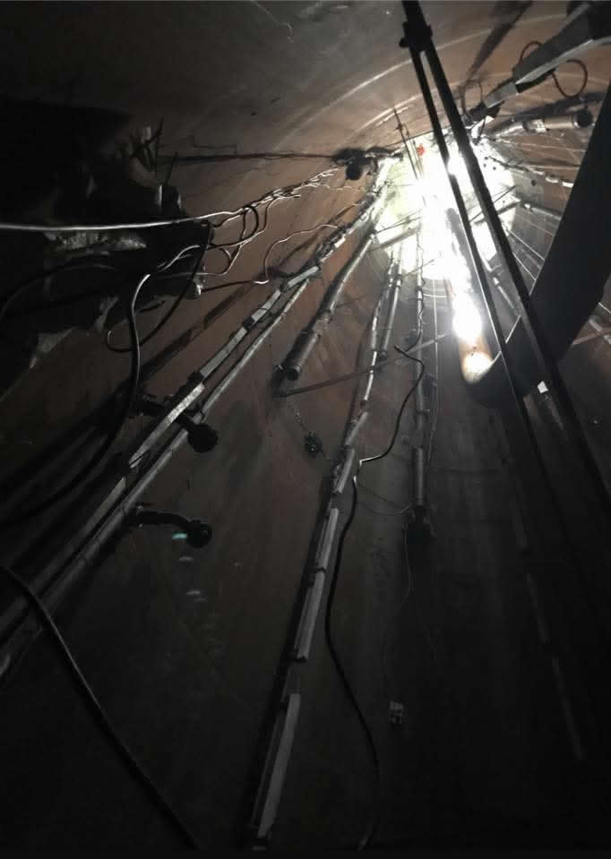 Cabling and access equipment within a narrow internal area of the structure